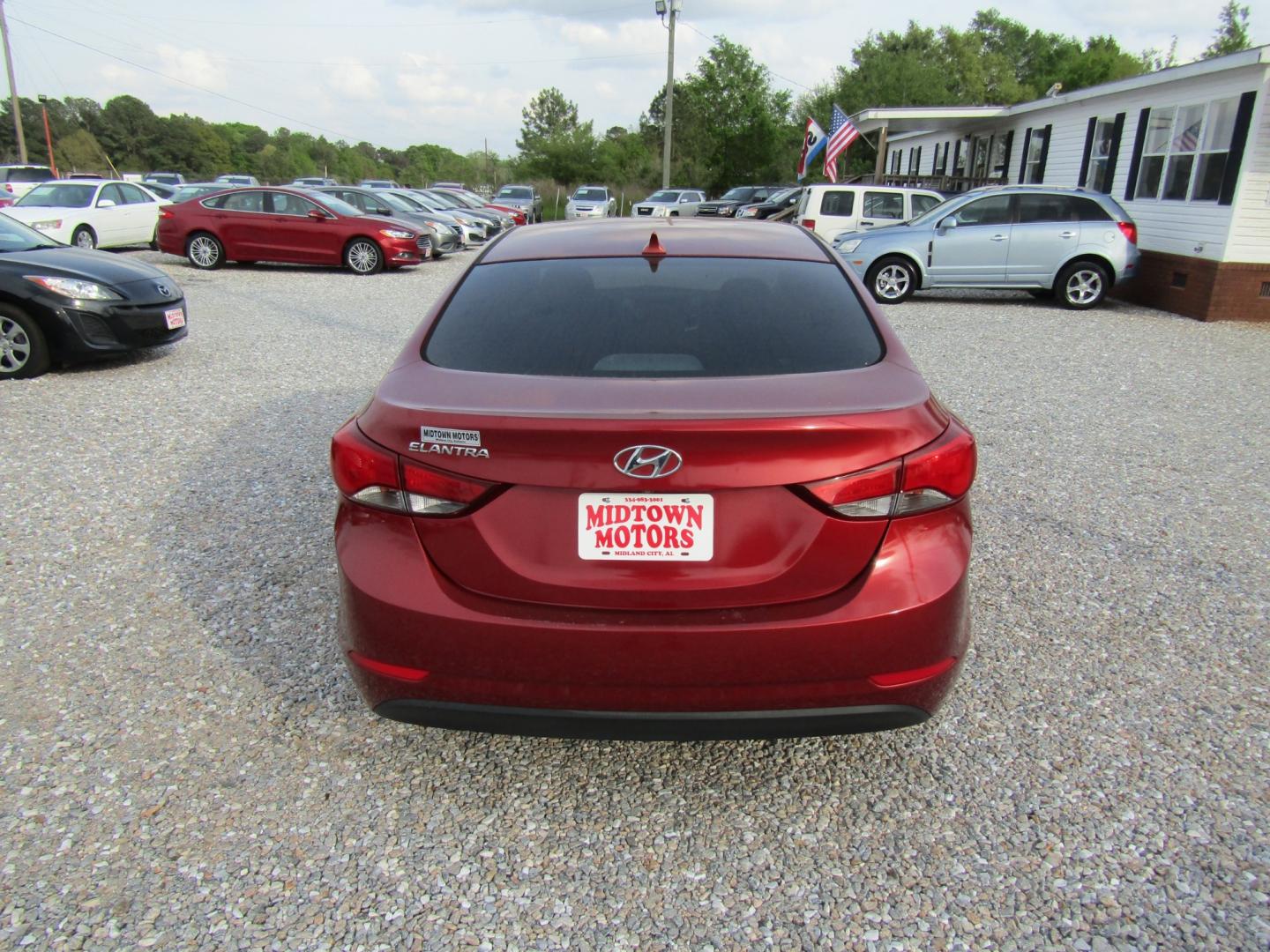 2016 Red /Gray Hyundai Elantra Limited (5NPDH4AE2GH) with an 1.8L L4 DOHC 16V engine, Automatic transmission, located at 15016 S Hwy 231, Midland City, AL, 36350, (334) 983-3001, 31.306210, -85.495277 - Photo#6